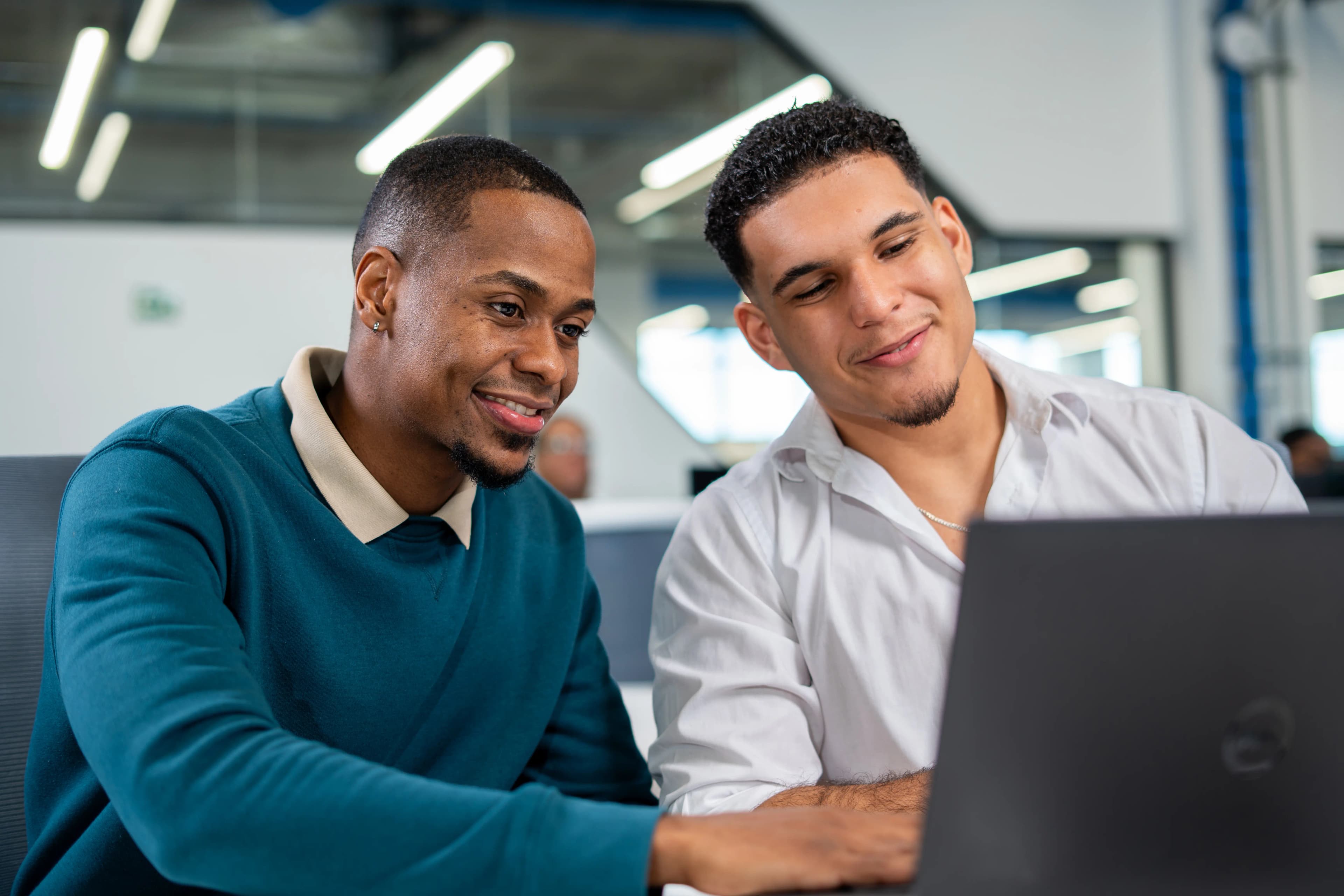 Horatio healthcare-trained support team working on laptops
